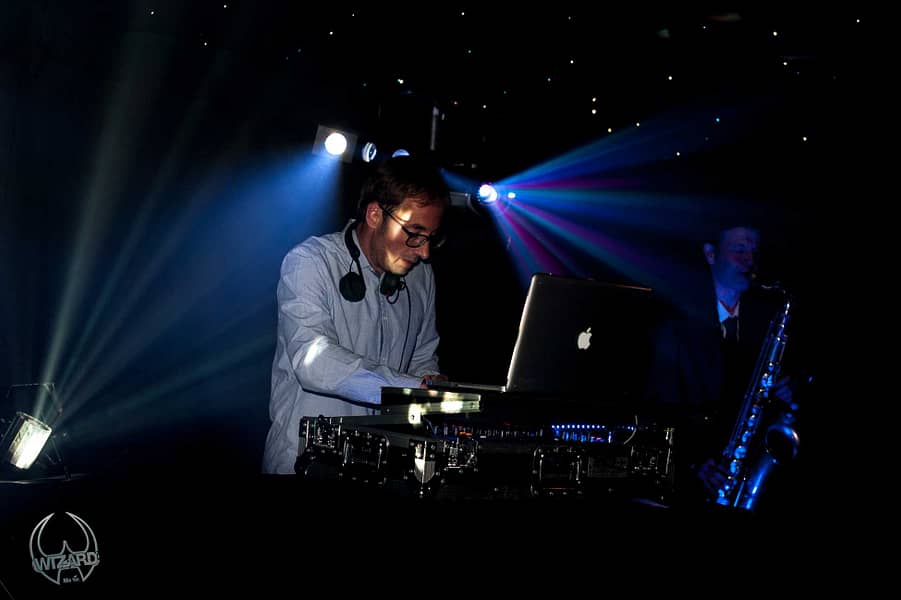 Dj-Sax-Bongos Picture of a DJ playing with a Sax and Bongo Player