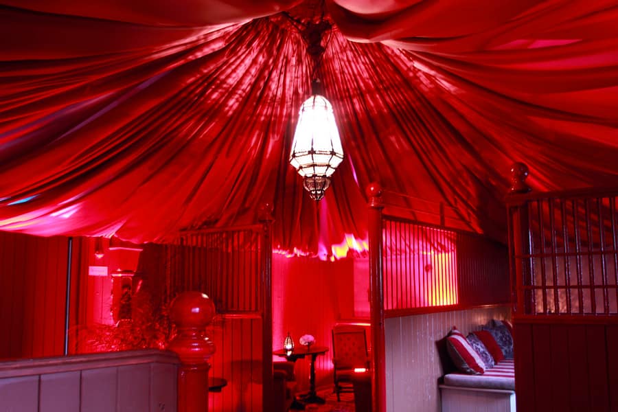 Venue Canopy Ceiling Image of a red canopied ceiling in a stable