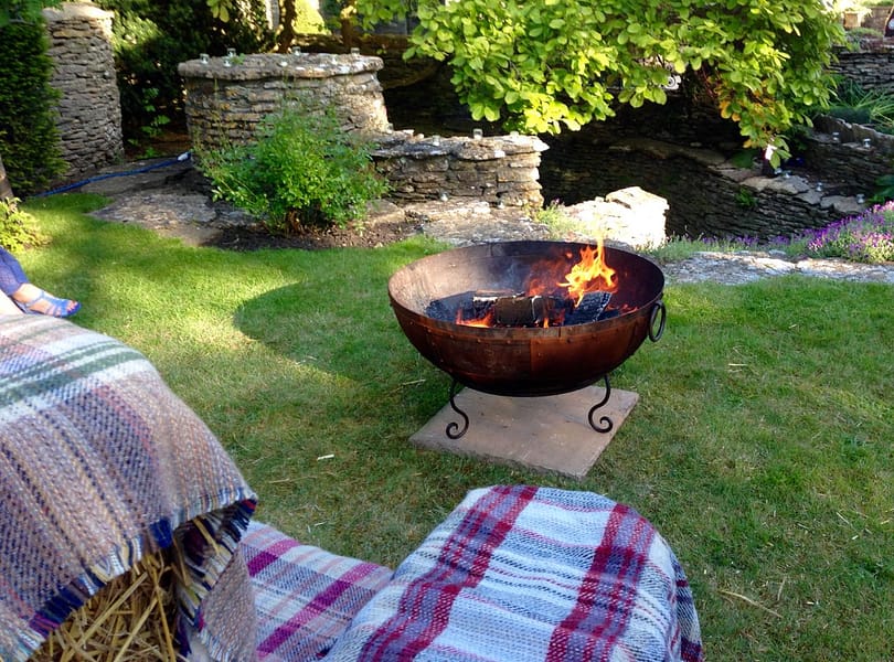 Fire-bowl-hire A fire-bowl located on a lawn