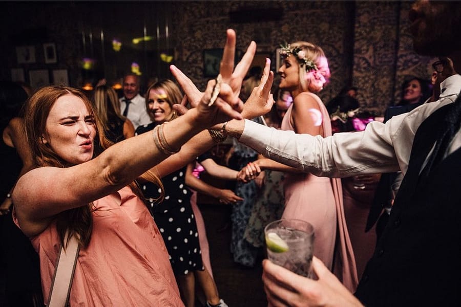 Jade and Emma, Babington House, Somerset, Samuel Docker Photography 2018 Oooh, pucker up on the dance-floor