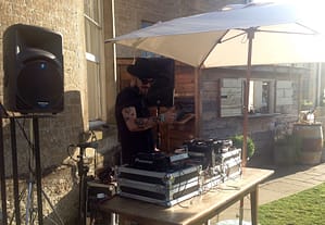 Image of DJ decks outside on a lovely summers day