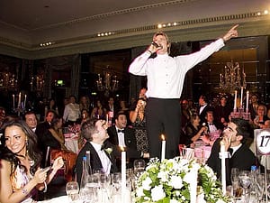 Image of the singing waiters performing