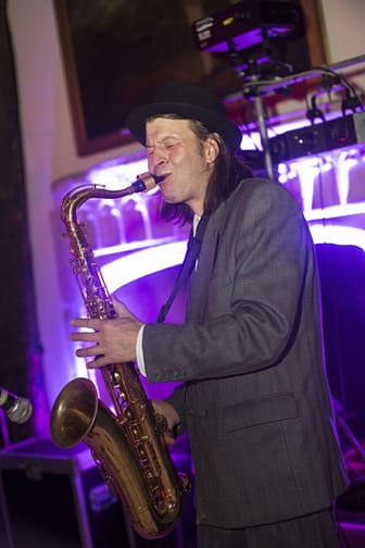 Image of a Sax player blowing hard