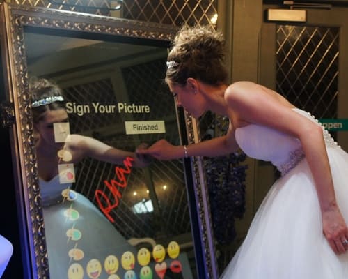 Bride signing magic mirror 